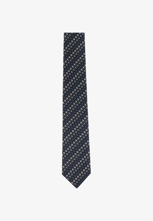 Cravatta blu scuro con un motivo a ripetizione di piccole forme astratte bianche e azzurre disposte diagonalmente.