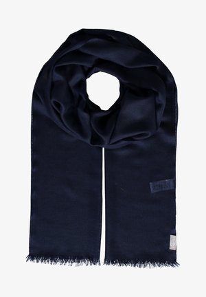 Navy blue scarf made of soft fabric, with a smooth texture and fringed ends. Notable branding tag on one side.