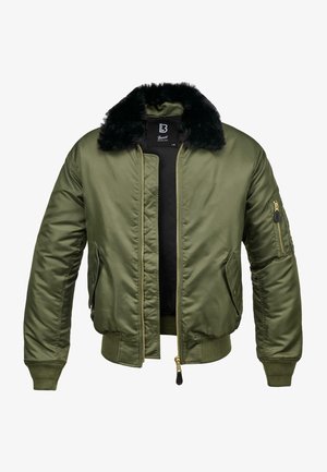 Giubbotto bomber verde oliva con colletto in pelliccia sintetica, chiusura frontale con zip, tasche laterali e tasca sulla manica con zip. Polsi e orlo a coste.