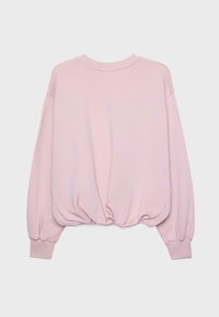 Sweat-shirt rose clair à manches longues avec ourlet et poignets froncés, col rond et coupe ample.