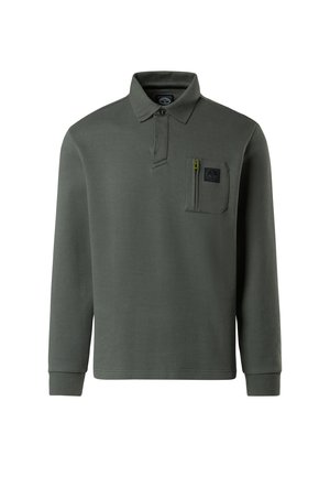 Dark green long-sleeve polo shirt made from textured fabric. Features a buttoned collar, a chest pocket with a yellow zipper, and ribbed cuffs.