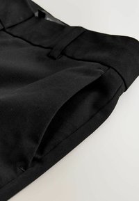 SLIM  - Nohavice chinos - black