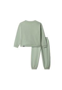 Light green sweatshirt and sweatpants set made of soft fabric. Features a crew neckline and elastic cuffs at wrists and ankles.