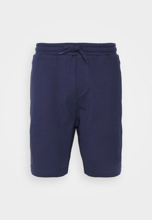 Pantalones cortos de algodón azul marino con cinturilla elástica, cordón ajustable y dos bolsillos laterales; textura suave y longitud por encima de la rodilla.
