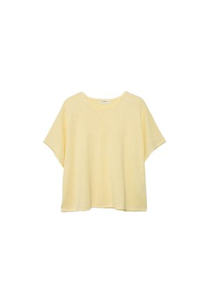 Pull à manches courtes jaune pâle avec col rond et coupe décontractée, présenté sur un fond blanc.