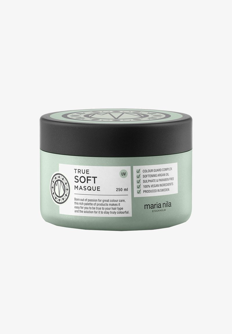 Barattolo verde di maschera per capelli con coperchio nero. L'etichetta mostra "True Soft Masque," 250 ml, vegana, senza solfati, con design floreale e icone.