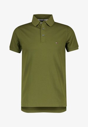 Olive green polo shirt made of textured fabric, featuring a classic collar, three-button placket, and a small logo on the chest.