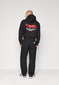 Carhartt WIP DOUBLE KNEE PANT - Broek - black rigid
