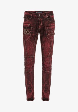 Rote, ausgewaschene Jeans aus Denim mit dekorativen Nähten, fünf Taschen und Metallakzenten. Figurbetontes Design mit schmal zulaufendem Bein und einzigartigen Mustern.