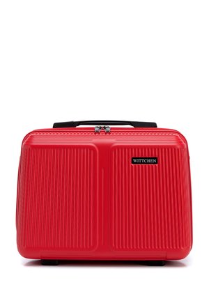 Valise cabine rouge rigide avec rainures verticales, poignée noire, double fermeture éclair et étiquette de marque Wittchen à l'avant.