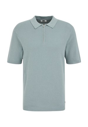 Krótki rękaw, jasnoniebieski dzianinowy polo z fakturowanym wzorem i przednim zamkiem pod kołnierzykiem.
