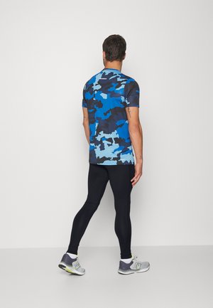 ACCELERATE TIGHT - Leggings - black