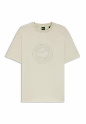 Beige katoenen t-shirt met een ronde hals, korte mouwen en een tonale logografiek op de voorkant met een tennisbalmotief.