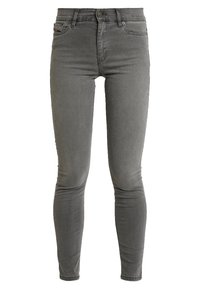 Vaqueros pitillo grises hechos de denim. De talle medio con textura suave, cinco bolsillos y cierre de botón. Diseño minimalista sin patrones visibles.