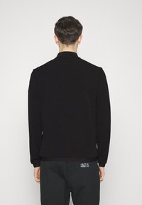 EA7 Emporio Armani Tröja med dragkedja - black
