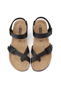 Sandali in pelle nera con soletta imbottita beige, dotati di cinturini incrociati e fibbia regolabile per una vestibilità sicura. Taglia 37.