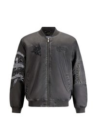 Black bomber jacket in a satin finish. Features embroidered eagle and text details on front and sleeve, zippered pocket, and ribbed cuffs.