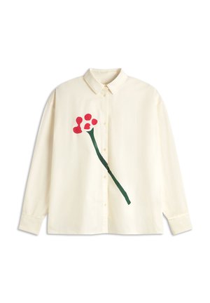 Camicia button-up crema con maniche lunghe, caratterizzata da un design floreale rosso e un gambo verde sul lato sinistro. Tessuto liscio, colletto classico.