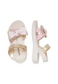 Sandali rosa pallido con una fascia metallica dorata e un fiocco caratterizzato da un motivo a quadretti. Dotati di chiusure in velcro regolabili e una suola bianca.