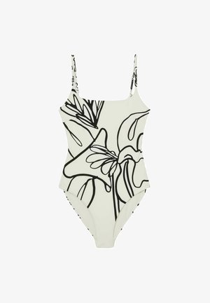 Maillot de bain une pièce blanc avec fines bretelles, présentant un grand motif floral abstrait en lignes noires.