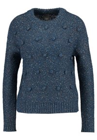 Pull tricoté bleu marine avec accents bouclés texturés, encolure ronde et ourlet côtelé. Fabriqué en laine douce et épaisse.