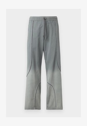 Pantaloni gri cu șnur, cu decolorare ușoară pe genunchi și detalii curbate cu margini negre în față și pe părți.