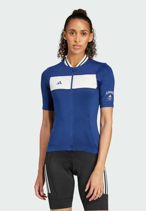 Short-sleeve cycling jersey made of blue fabric with white stripe across the chest, featuring a front zipper and logo accents on the sleeve.