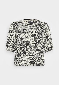 Short-sleeve top featuring a black and white zebra stripe pattern. Made of a soft, textured fabric with a relaxed fit and round neckline.