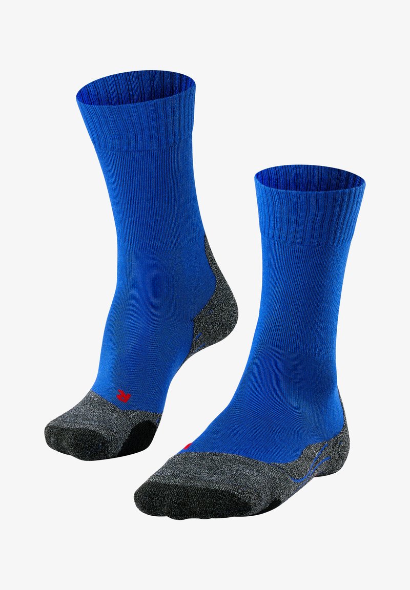 Calcetines azules con puños acanalados, talones y puntas reforzados en gris, y un logo de acento rojo. Fabricados con un material suave y elástico.