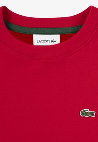 Lacoste CORE TEE - T-shirts - red