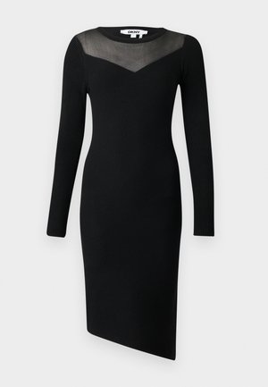 Fekete bordás, hosszú ujjú ruha áttetsző hálós nyakkivágással és aszimmetrikus szegéllyel. Testhez simuló szabású, kerek nyakkivágással rendelkezik.