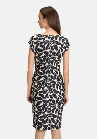 Cartoon MIT RAFFUNG
 - Jerseykleid - weiß schwarz