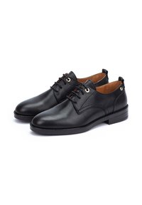 Black leather dress shoes with a smooth texture, rounded toe, lace-up design, gold eyelets, and a low heel. Interior is brown.