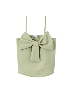 Top corto verde chiaro con un grande fiocco sul davanti, spalline regolabili e un tessuto strutturato. Include una parte posteriore elasticizzata per una vestibilità migliore.