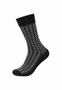 Sorte og grå mønstrede sokker med et ternet design. Har ribbet sort kant og glat stof. Forlænget form for foddækning.