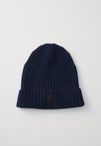 Navy beanie hat made of ribbed knit fabric, featuring a folded cuff and a black hexagonal logo patch on the front.
