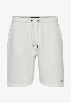 Fehér pamut rövidnadrág rugalmas derékkal, fekete húzózsinórral, oldalsó zsebekkel és egy kis márkacÍmkével a bal lábon.