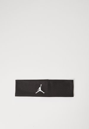 Fekete fejpánt textúrált hálós kialakítással és fehér Jumpman logóval az elülső részen. A fejpánt téglalap alakú, és sportos viselethez alkalmas.