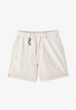 Shorts en coton beige avec une ceinture élastique, des poches avant et un cordon de serrage avec des accents noirs et jaunes. Revers pliés en bas.