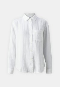 Chemise blanche à boutons en coton texturé, avec une poche poitrine unique et des manches longues aux poignets retroussés.