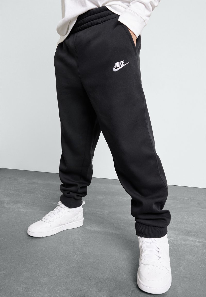 Nike Sportswear - CLUB UNISEX - Tracksuit bottoms - black/white, Enlarge