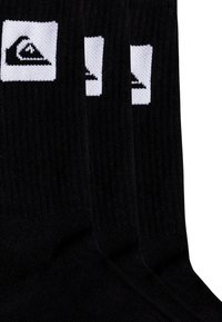 Black socks with ribbed texture, featuring two white logo designs on top. Made from a soft, stretchy material.