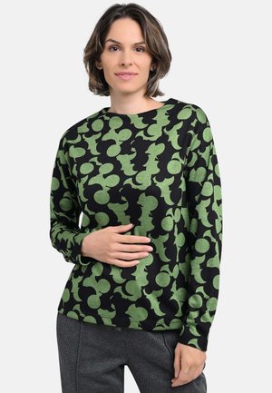 Long-sleeve green and black patterned shirt featuring abstract shapes, made of soft fabric, with a relaxed fit and round neckline.