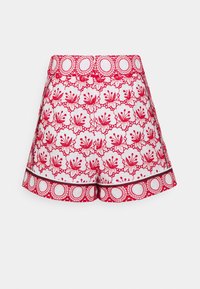 Shorts à motifs floraux rouges et blancs avec un design texturé, présentant une bordure contrastante à la taille et à l'ourlet.