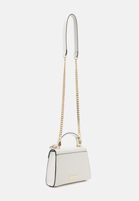 White leather handbag with a structured shape, contrasting black trim, and a gold chain strap. Features a top handle and gold hardware accents.