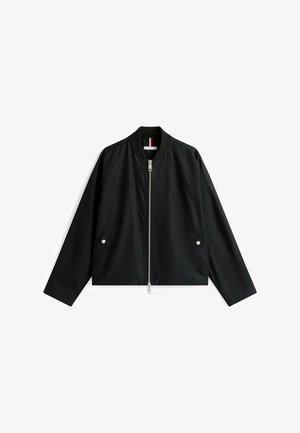 Black bomber jacket with a front zipper, side pockets, and a round neckline. Made of smooth, lightweight material with minimalistic design.