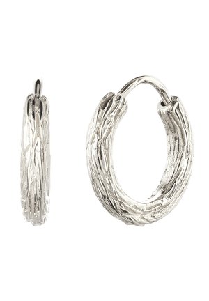 Silver textured oval hoop earrings with a bark-like pattern and a hinged clasp, shown from front and side views.