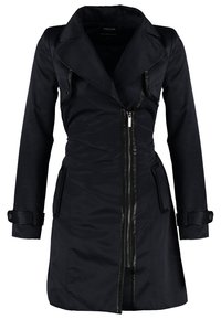 Black fabric coat with a lapel collar, asymmetrical zipper, two front pockets, and textured leather accents on the edges and cuffs.