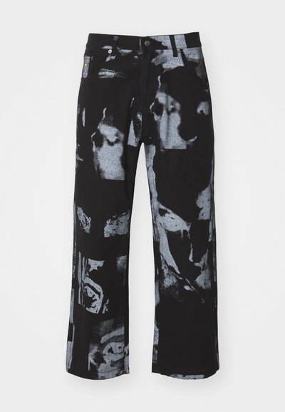Kidsuper FACES COLLAGE PANTS - Traperice opuštenog kroja - black