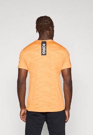 PERFORMANCE - T-shirt imprimé - sun orange